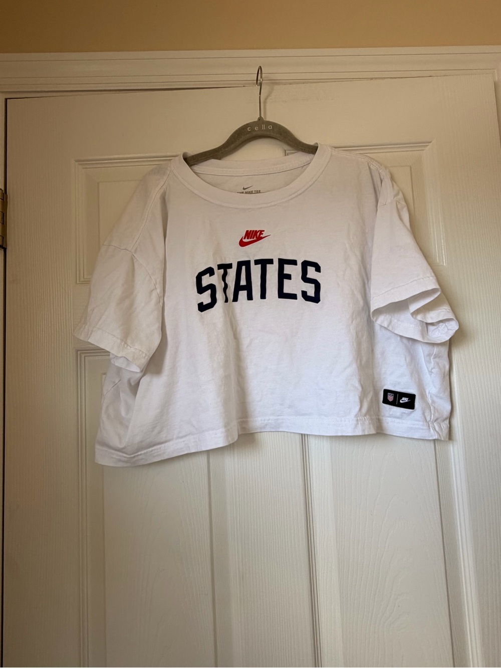 Nike White Cropped Tee with Navy 'STATES' and Red Swoosh